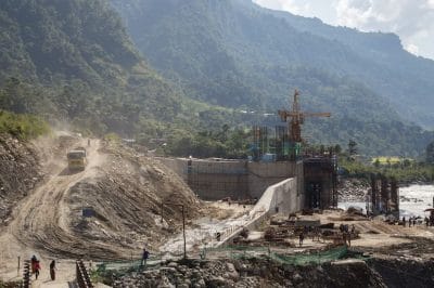 construction equipment and half-built structures in Nepal mountains