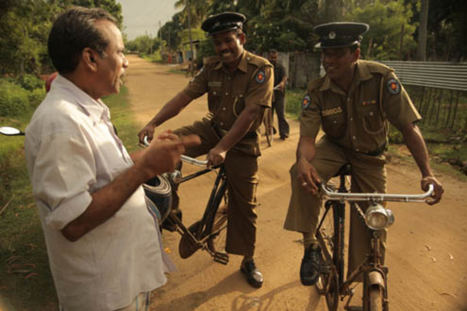 Sri Lankan police patrol on bicycles