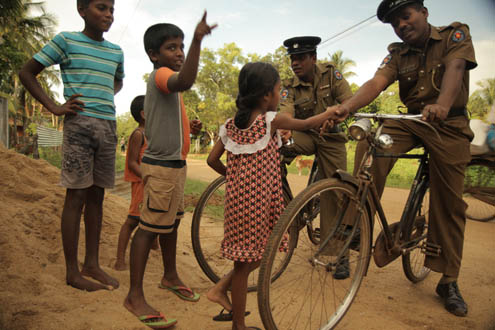 Police patrol on bicycles in Sri Lanka