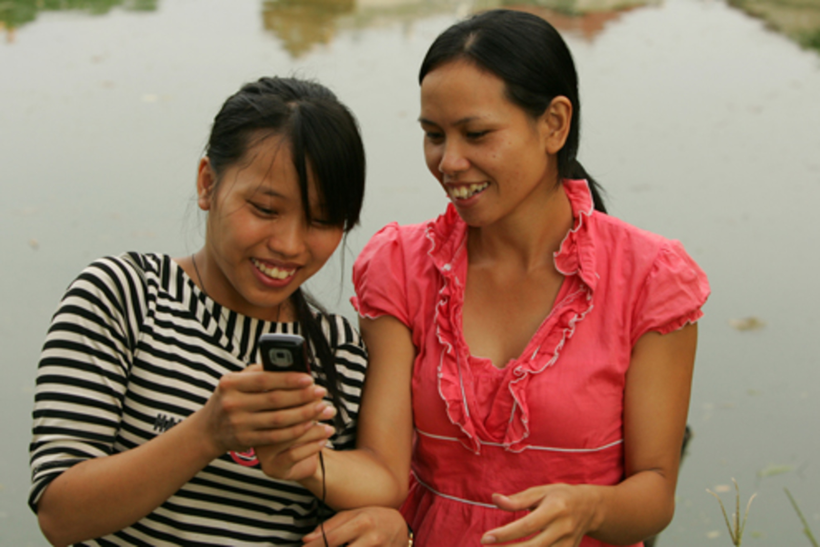 Vietnamese youth on their phone